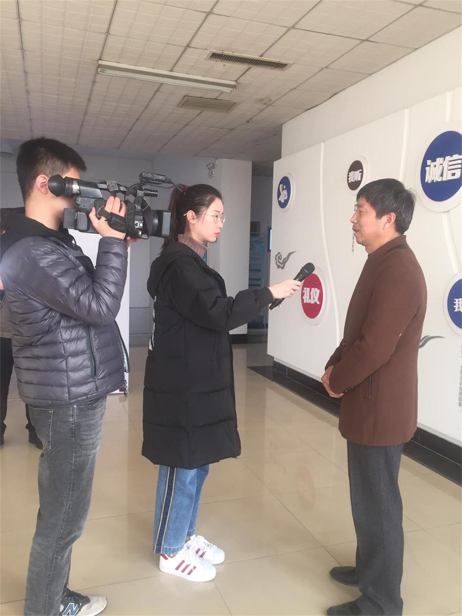 周忠太接受采访